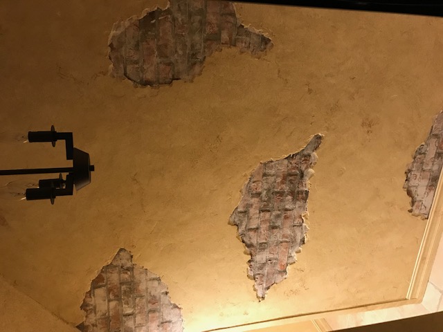 trowel texture of wine room with bricks